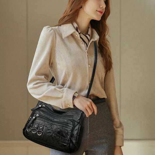 Sac Charmance™ polyvalent pour occasions décontractées et professionnelles.